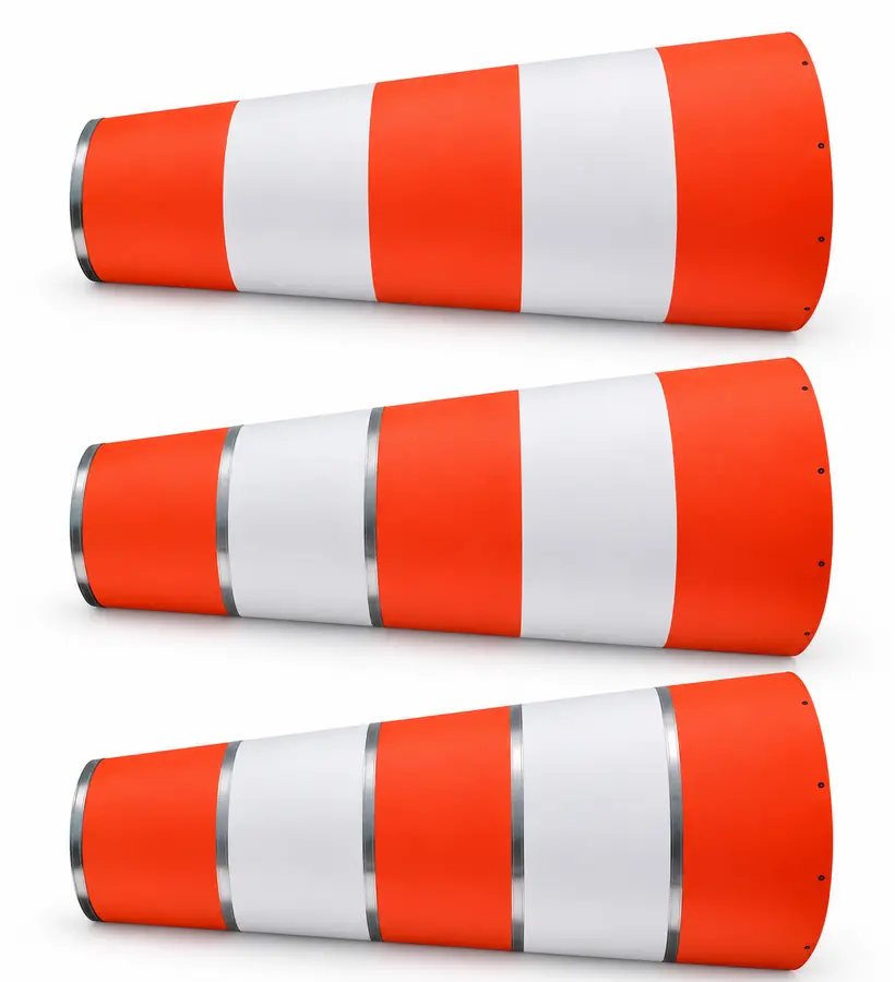 Three red and white windsocks showing one, three and five reflective tape bands from top to bottom.